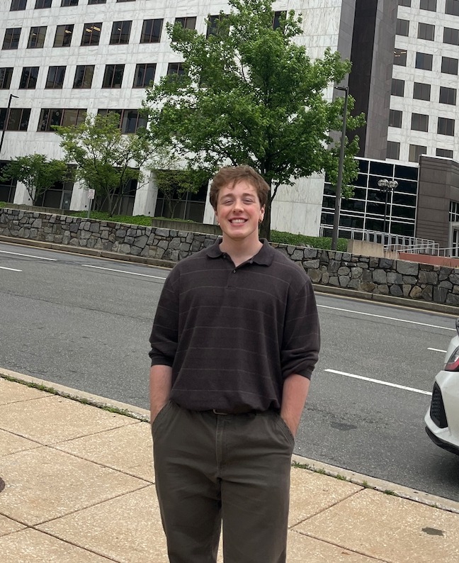 Student poses at NRC internship site