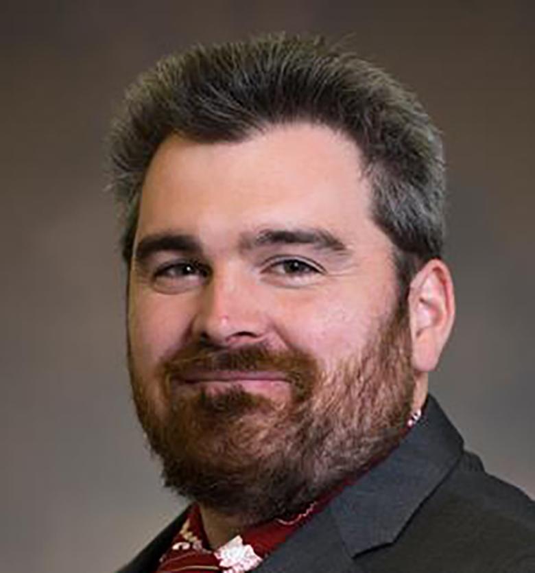 A headshot of Ohio University Computer Science Professor Chad Mourning.