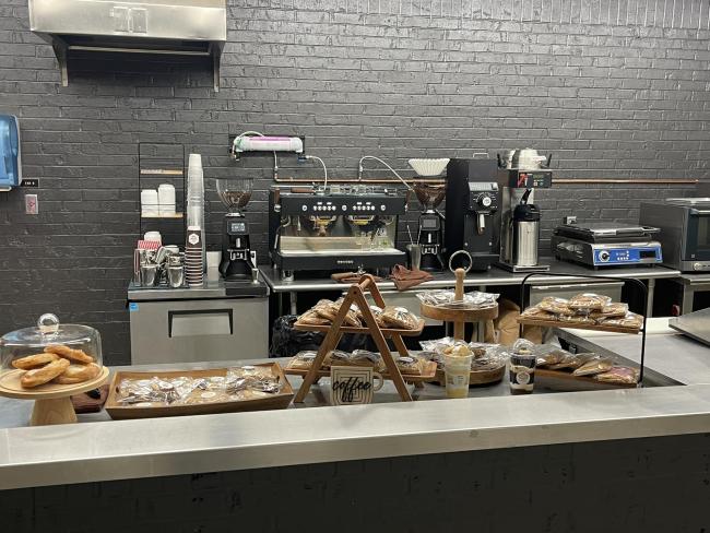 pastries and coffee machine at the Coffee Hub