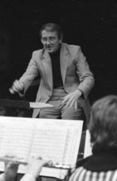 Ronald Sociarelli directing a wind symphony in 1984