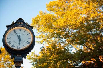 Looking up at the Ohio University clock outside of Baker University Center