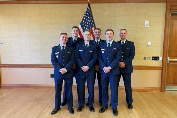 Group of six standing: Front L-R: 2Lt Carter Fee, 2Lt Kyle Dunlap, 2Lt Luke Hamlin. Back L-R: 2Lt Mark Vorndran, 2Lt Derek Weber, 2Lt Cole Losoncy