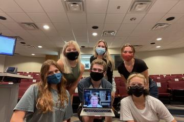 Front row, left to right: Claire Schiopota, Eric Boll, adviser Nerissa Young (on computer screen) and Isabel Nissley. Back row, left to right: Kayla Bennett, Helen Widman and Sophie Young