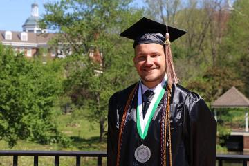 Jameson Hern in graduation robes