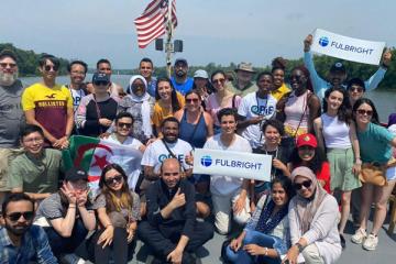 Fulbright scholars enjoy a cruise along the Ohio River.