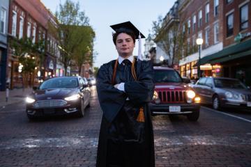 OHIO graduate Matt Geiger stands on Court Street in Athens, Ohio. 