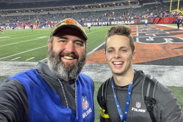 Evan Shaw and Jack Cowman are shown at an NFL game