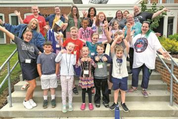 Students and staff pose for a photo at the STREAM Camp