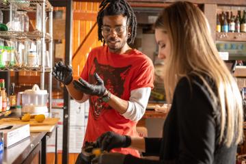 Jackie O's Brewer Deshawn Brunner and Francesca Carney get ready to brew “Sun Tea.” a recipe she developed in CHEM4501 in 2022.