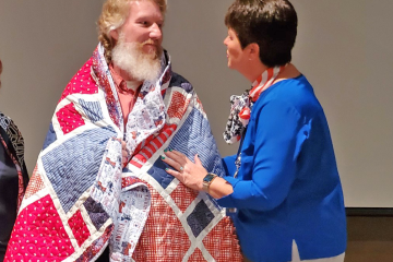 veteran accepting quilt of valor