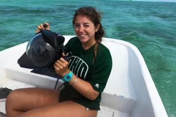 Alie Skowronski is shown in a boat out on the water