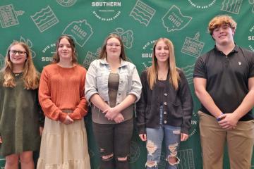 five students standing