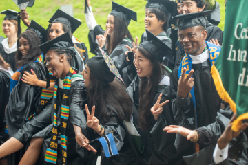 Graduates of the Center for International Studies gather together for a photo at Commencement