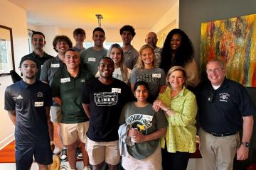 President Gonzalez is shown with members of the Presidential Ambassadors program