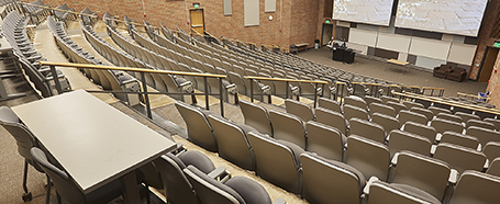 Morton hall theater style classroom with projector screens