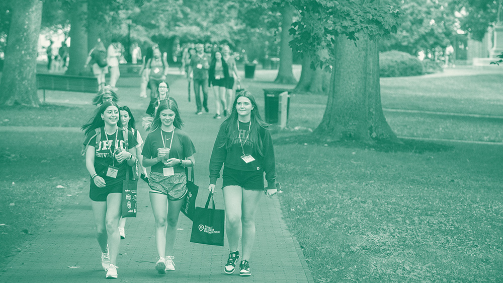 Incoming students walking on the Athens campus with Bobcat Student Orientation leader