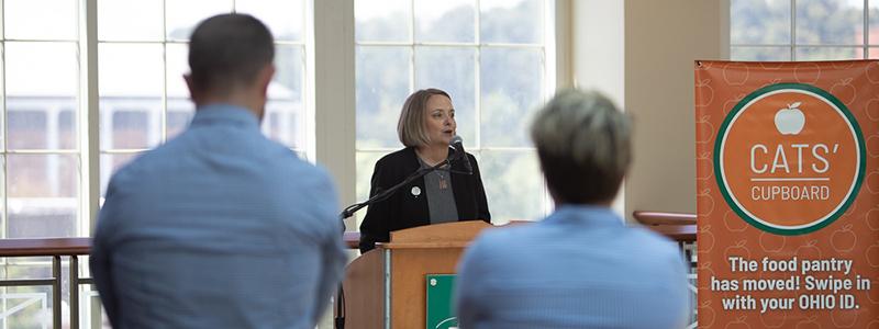 Kathy Fahl speaking at Cats' Cupboard grand reopening