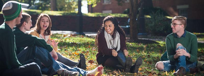 Students sitting on College Green