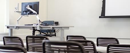 empty chairs in ellis hall and presenter's computer