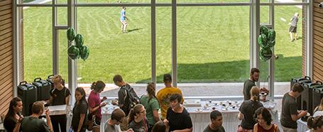 overhead view of people gathering in llc lobby