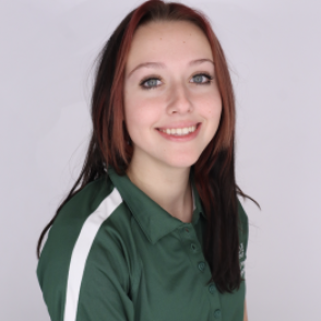 Reagan in a dark green Bobcat Student Orientation shirt, smiling at the camera.