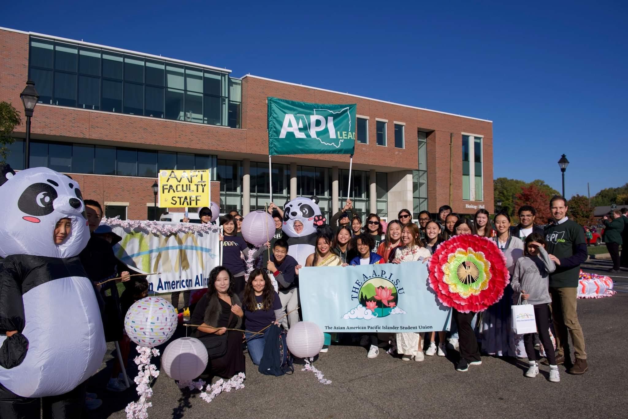 Asian American advocacy organizations gather before the homecoming parade 