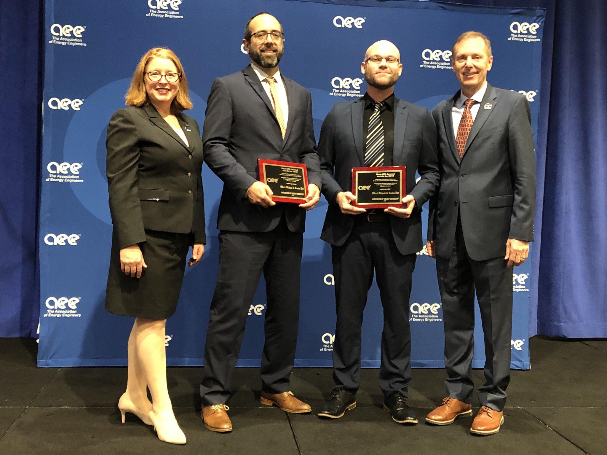 Michaud and Pitt receiving AEE award