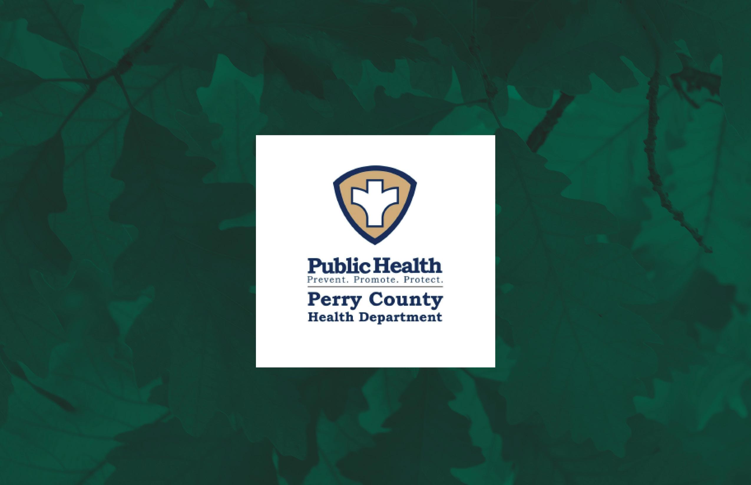 Perry County Health Department Logo in a white square surrounded by green leaf texture